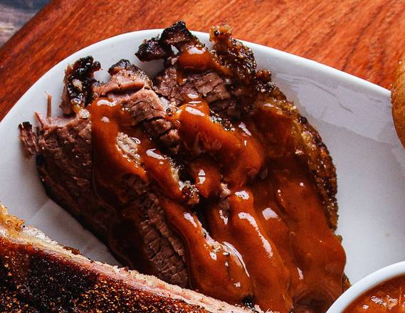 Order Brisket by the Pound food online from Tops Bar-B-Q #16 store, Olive Branch on bringmethat.com