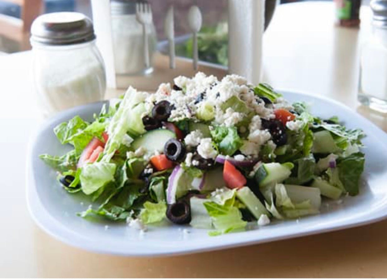 Order Greek Salad - Greek Salad food online from Oros Pizza & Bakery store, Van Nuys on bringmethat.com