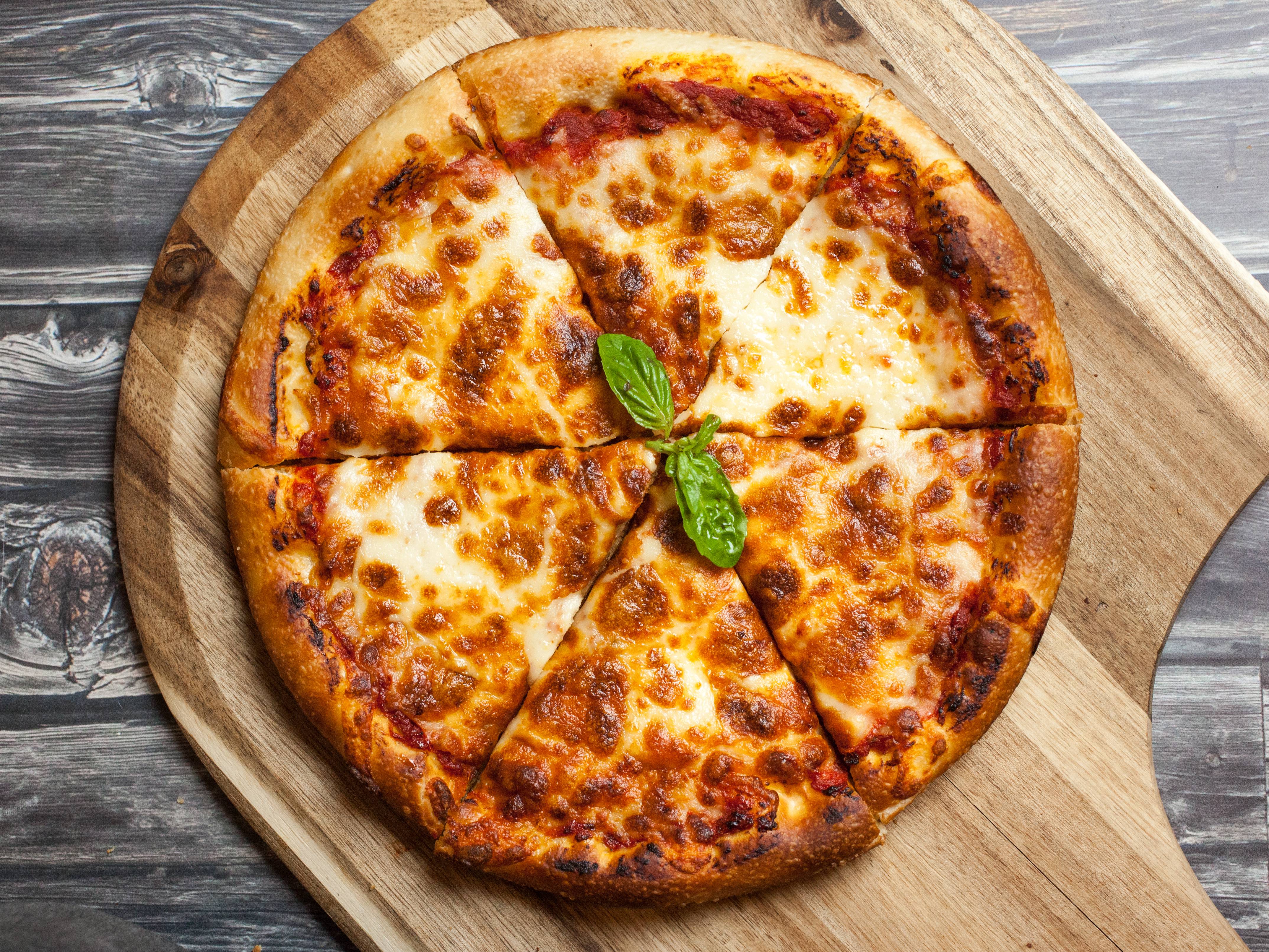Order Classic Cheese Pizza food online from Milano Pizza and Pasta store, Seattle on bringmethat.com