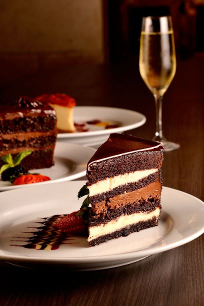 Order Tuxedo Chocolate Cake food online from Alicia Mexican Grille store, Katy on bringmethat.com