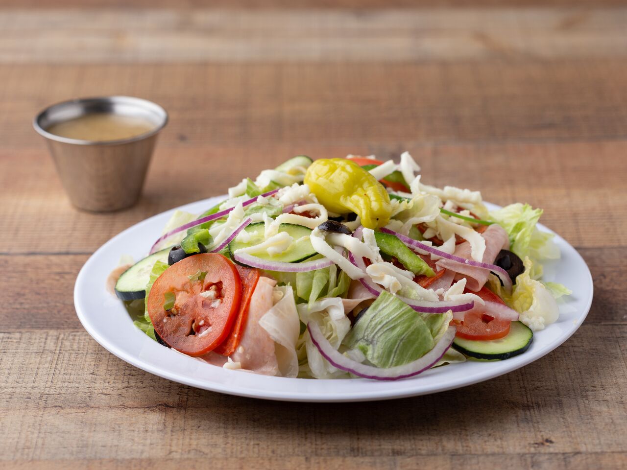 Order Antipasto Salad food online from Peppoli Pizza & Philly Steak store, San Diego on bringmethat.com