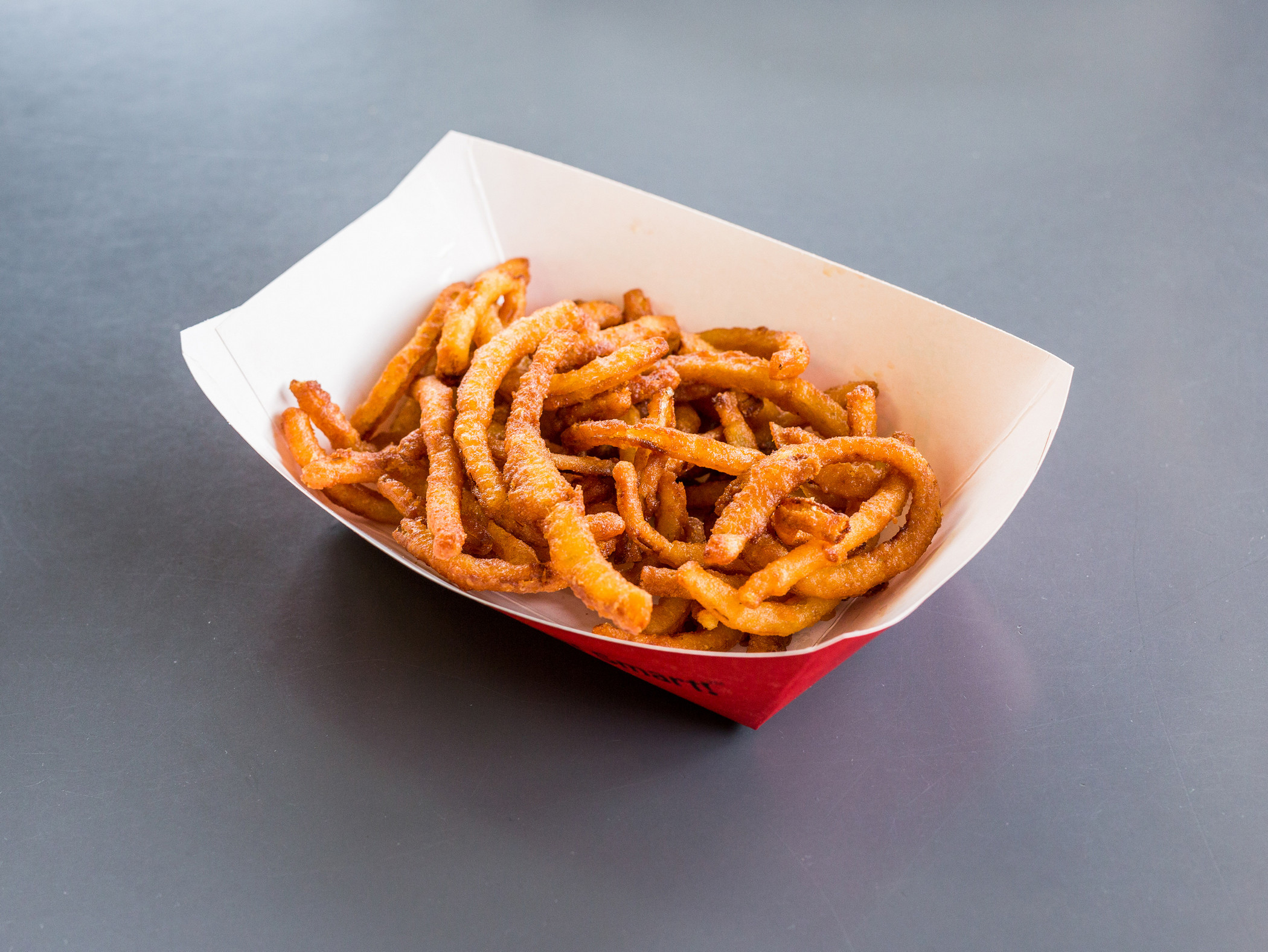 Order Onion Rings food online from Byrons Hot Dog Haus store, Chicago on bringmethat.com