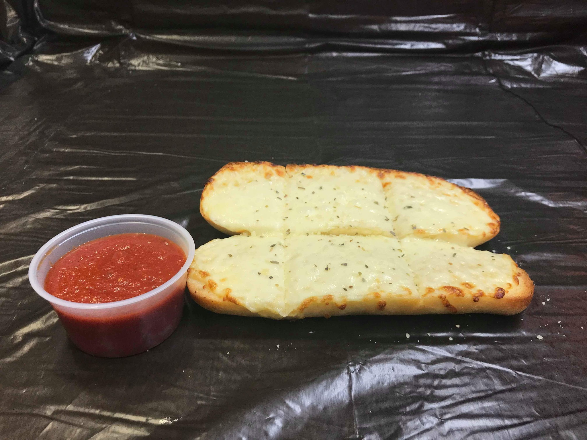 Order Garlic Bread with Cheese food online from Mama Cimino's store, Dixon on bringmethat.com