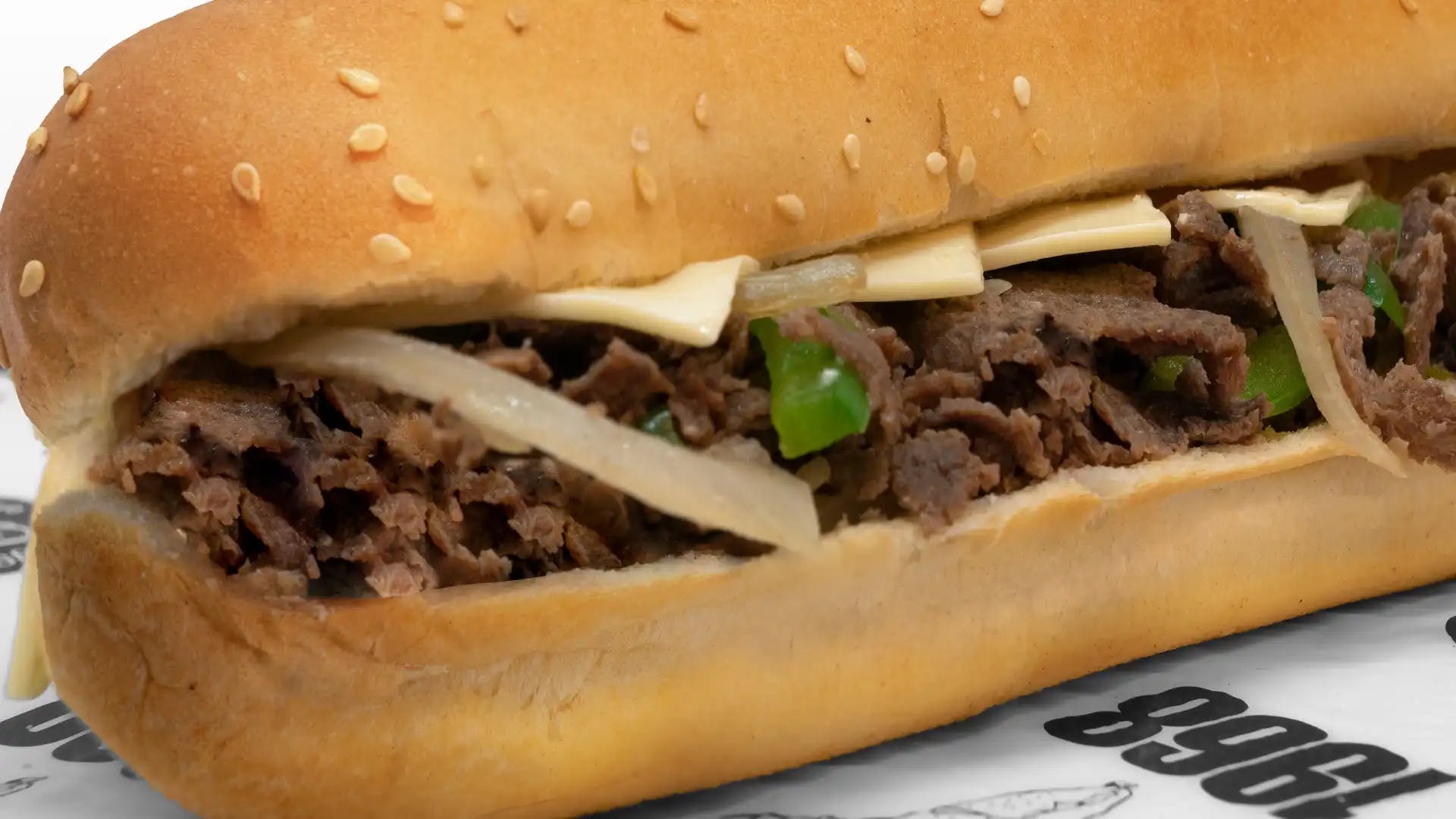 Order Philly Cheesesteak Sub - Small food online from Tubby's Grilled Submarines store, Westland on bringmethat.com