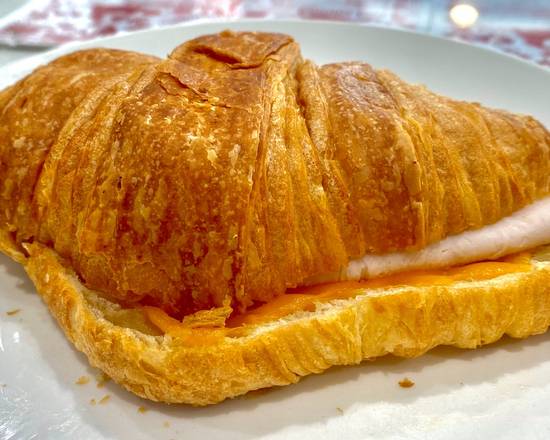 Order Turkey Breast and Cheddar Cheese Croissant food online from Twisted St. Cafe store, San Francisco on bringmethat.com