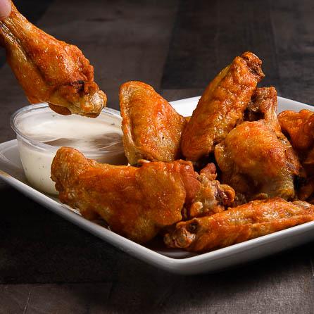 Order 10 piece Original Buffalo Wings food online from Lucky Duck Pizza store, Waterford Township on bringmethat.com
