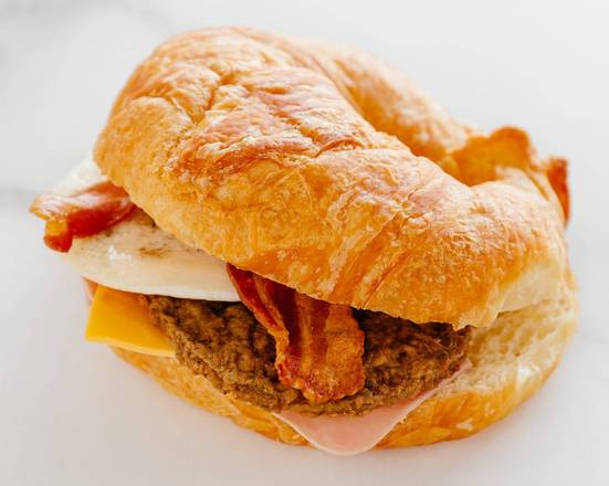 Order Ham, Bacon, Egg, Cheese & Sausage Croissant food online from Kim's Donuts store, Dallas on bringmethat.com