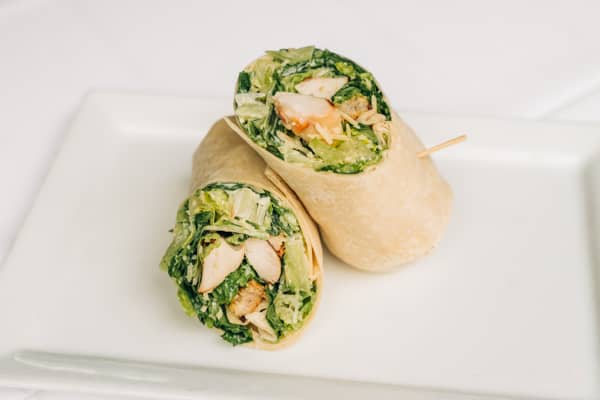 Order Grilled Chicken Ceaser Salad Wrap food online from The Bagel Place store, East Meadow on bringmethat.com