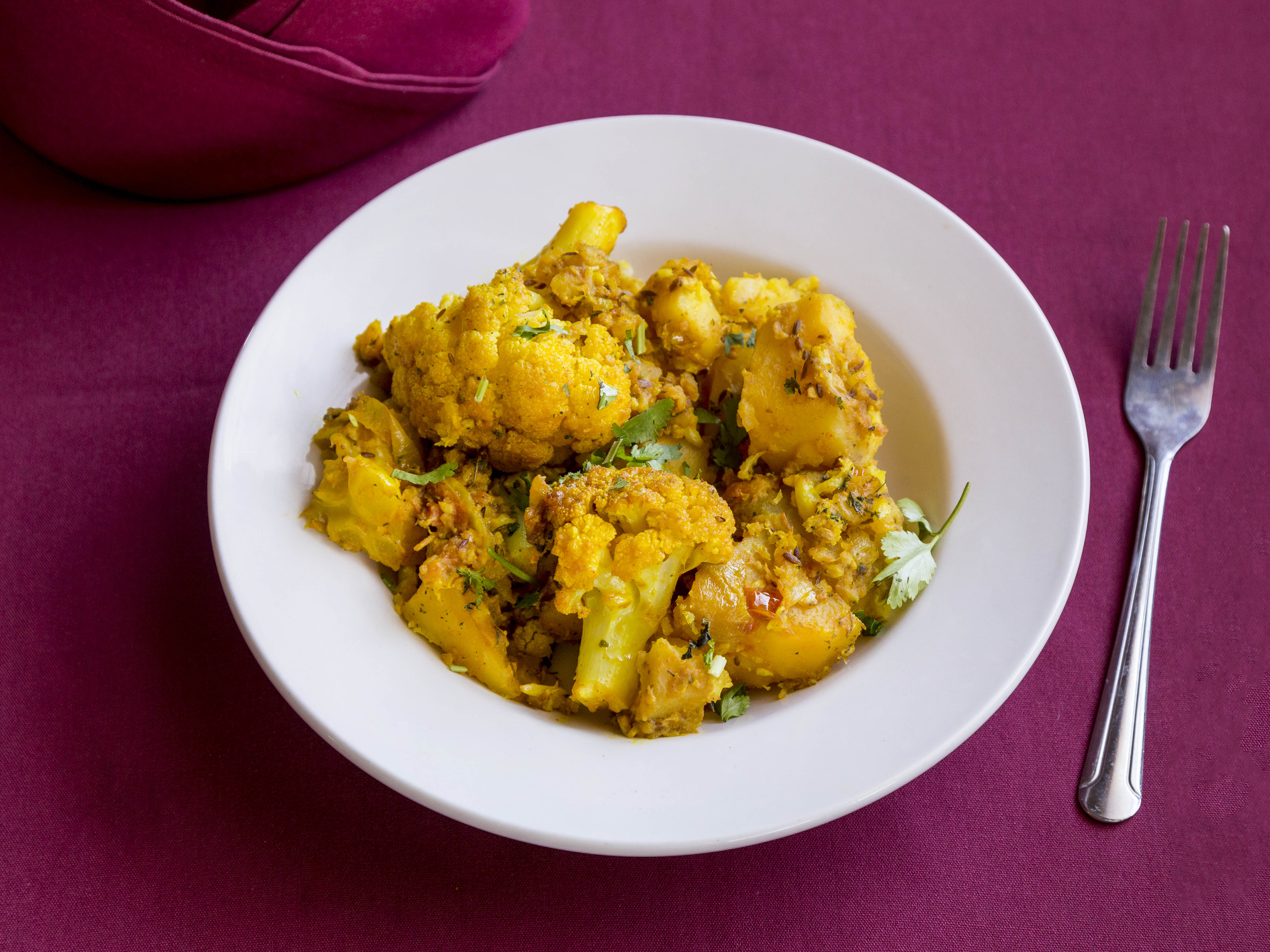 Order Aloo Gobhi food online from Nandini Indian Cuisine store, Tempe on bringmethat.com