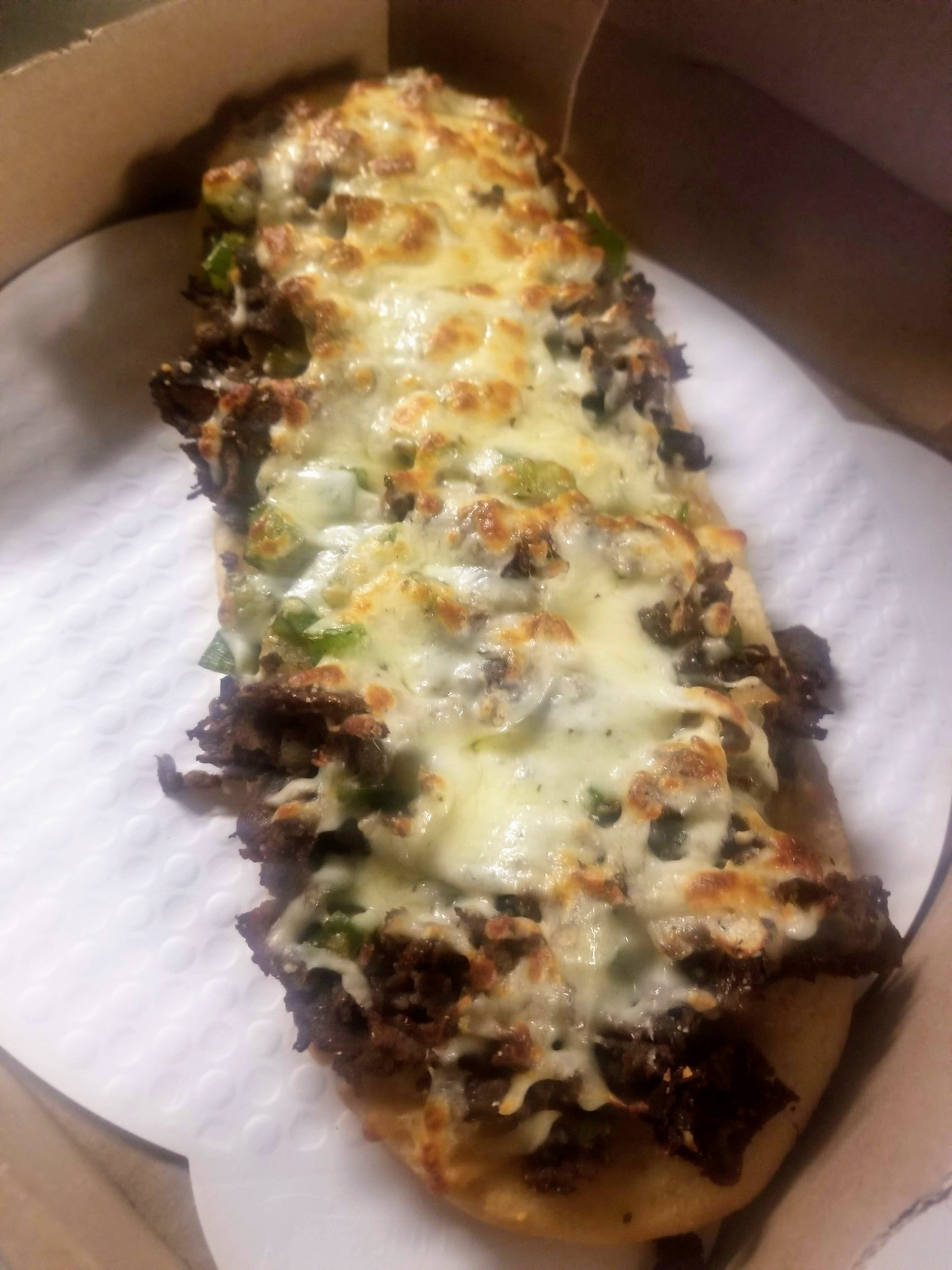 Order Philly Steak Flatbreads - Flatbread food online from Novotny's Groceries & Pizza store, Worthington on bringmethat.com