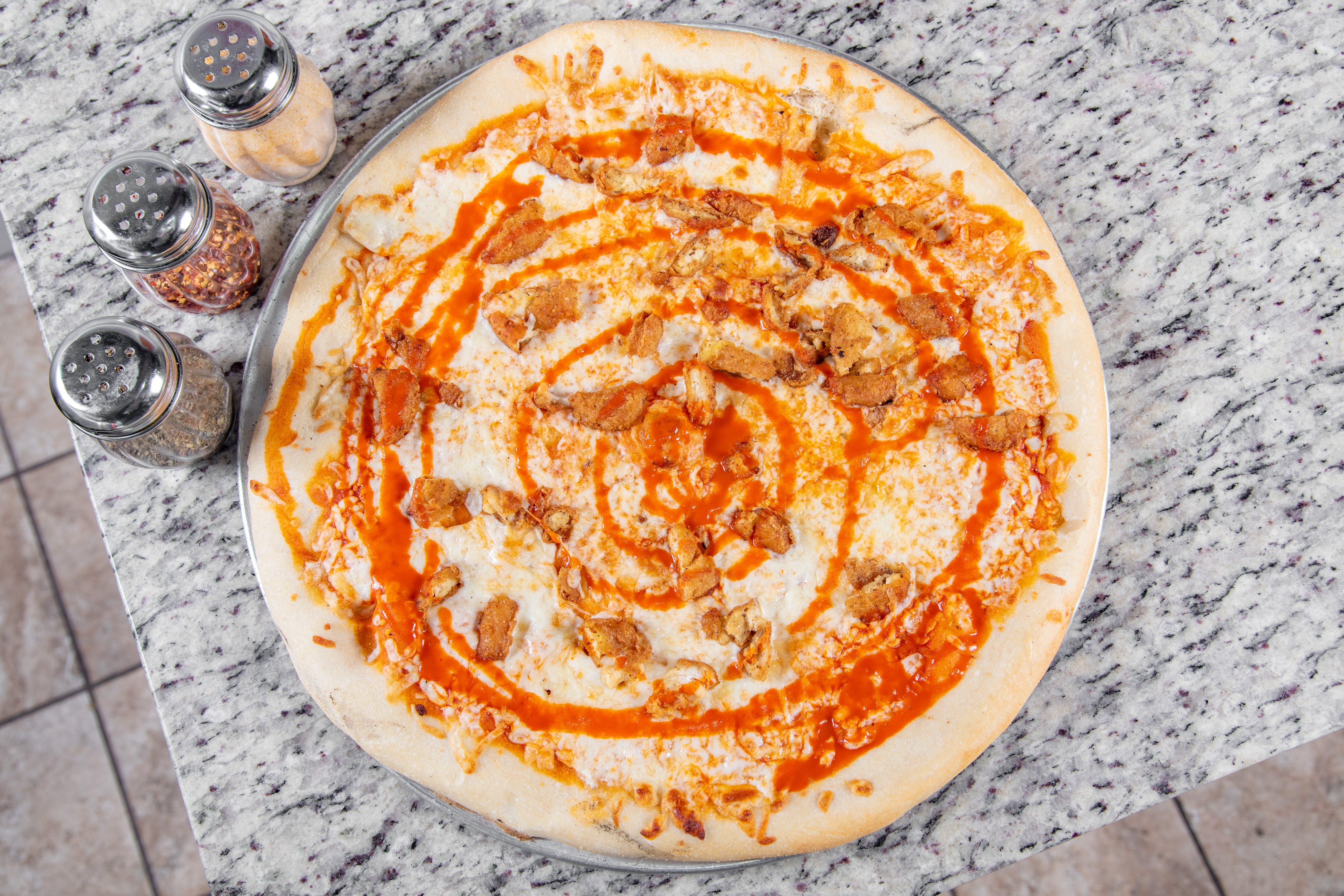 Order 122. Buffalo Chicken Pizza - Large 16'' food online from Crown's Fried Chicken & Pizza store, East Orange on bringmethat.com