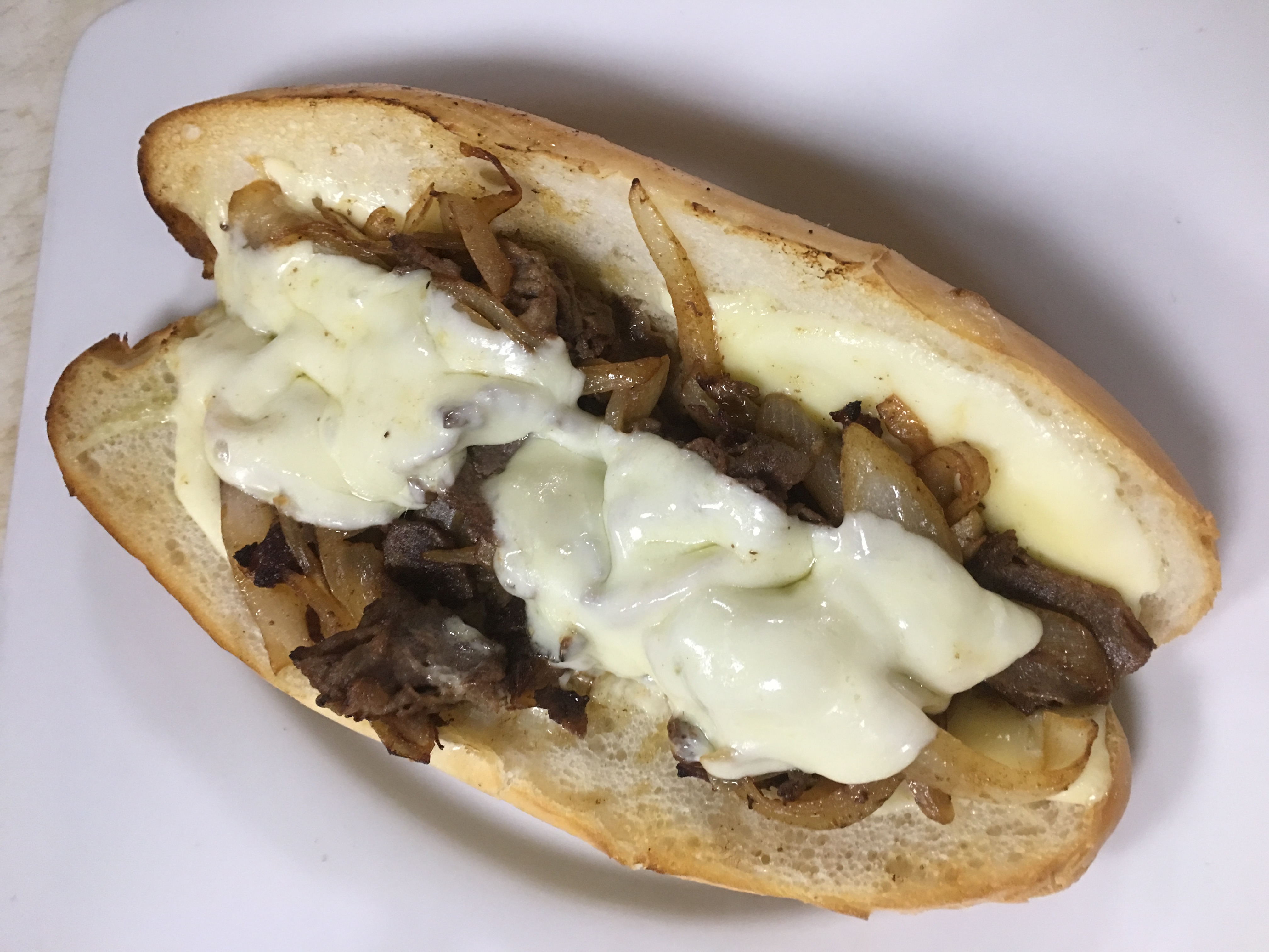 Order Philly Cheese Steak Hero food online from Toskana Pizzeria Restaurant Cafe store, Little Neck on bringmethat.com