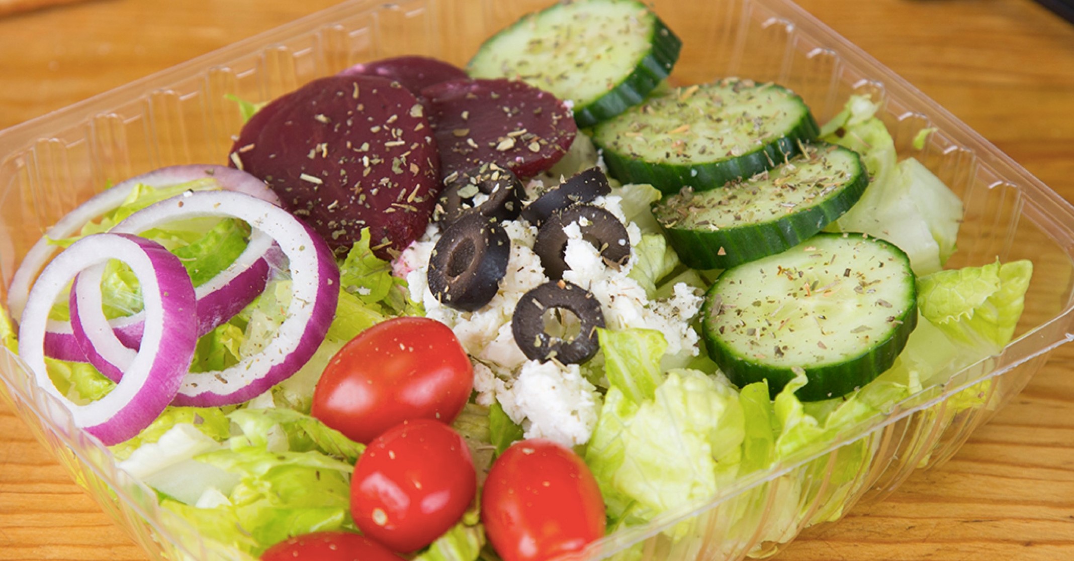 Order Greek Salad food online from Pizza Xpress store, Vista on bringmethat.com