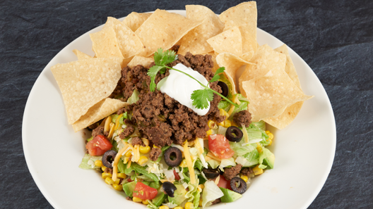 Order Taco Salad Beef food online from Rainforest Cafe store, Atlantic City on bringmethat.com