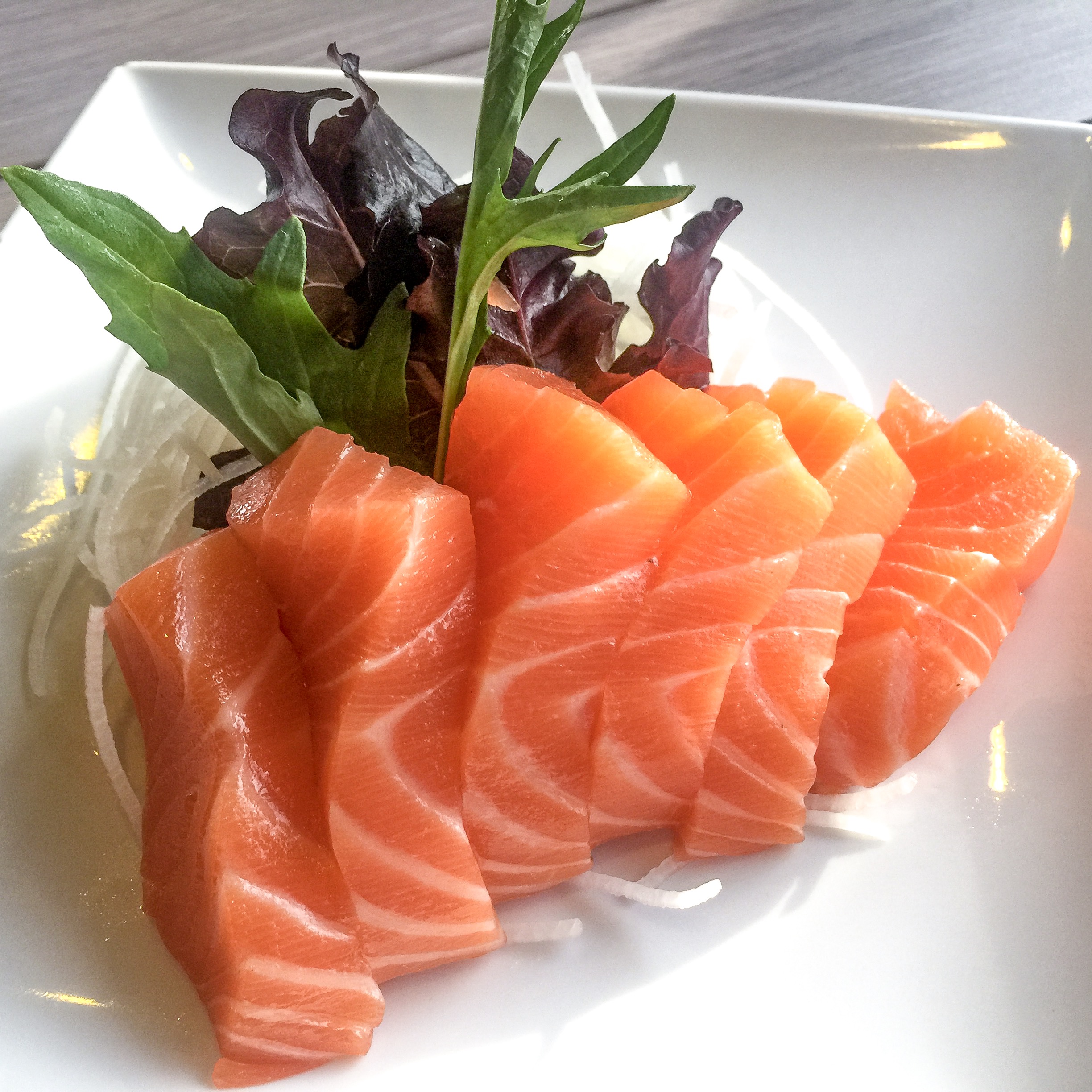 Order Salmon Sashimi food online from Rollstop Sushi store, San Pedro on bringmethat.com