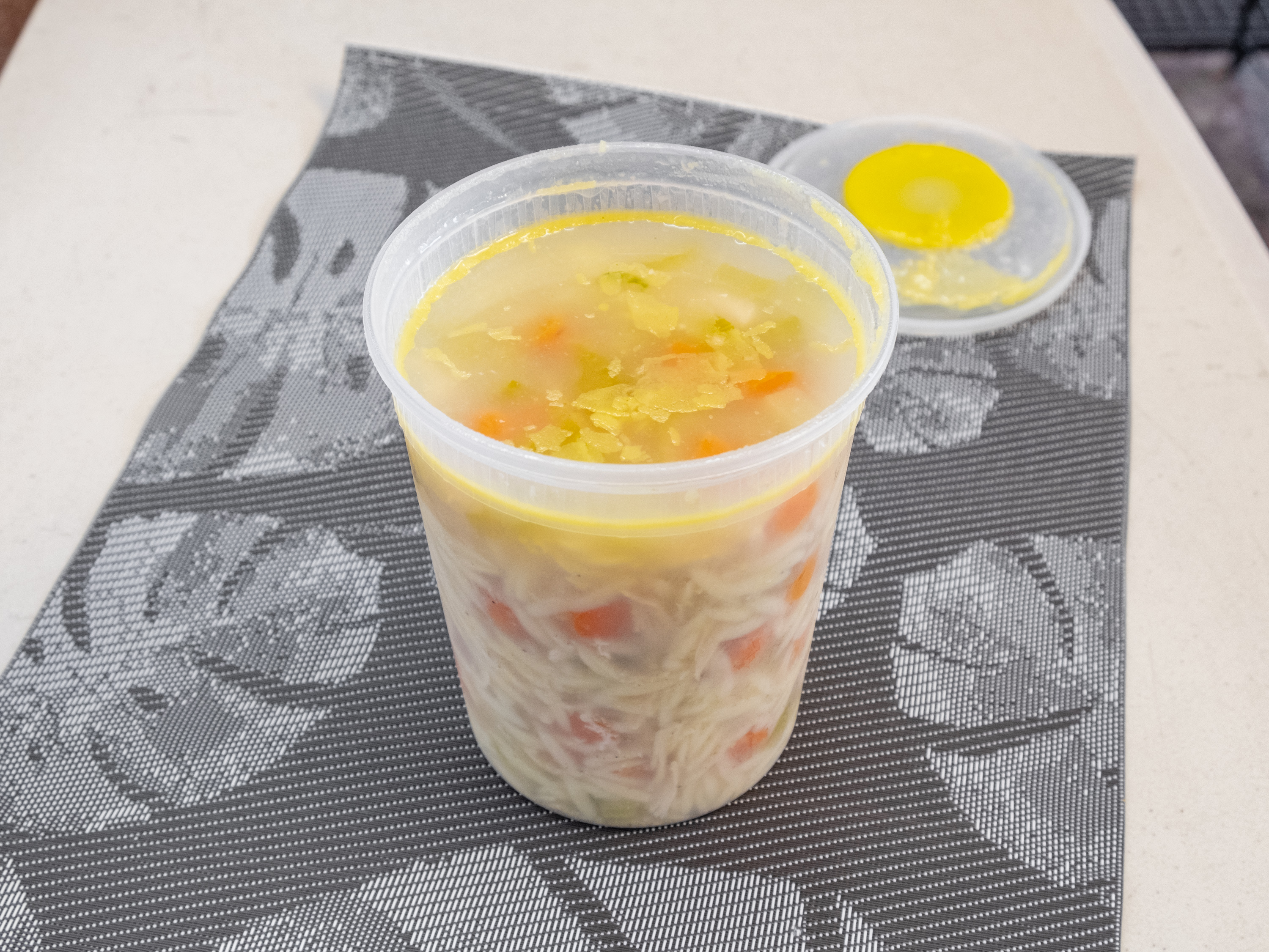Order Quart of Chicken and Orzo Soup food online from Grove Deli Montclair store, Montclair on bringmethat.com