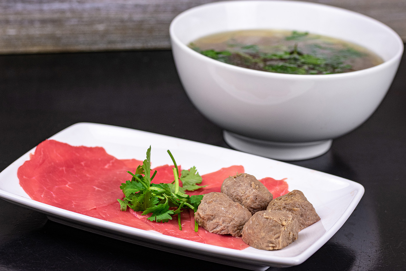 Order 6. Rare Flank Steak with Meatballs Pho food online from Kv Noodle store, San Jose on bringmethat.com