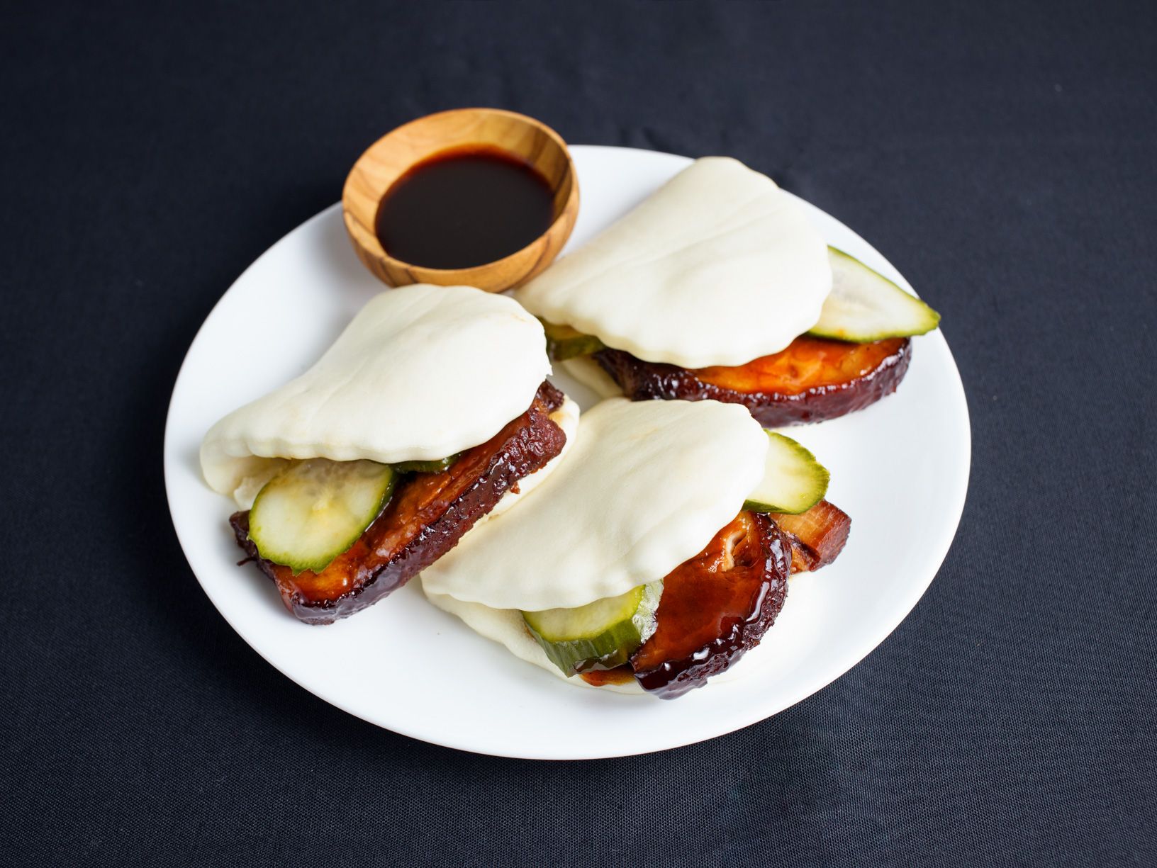 Order Pork Belly Baos food online from China Live Signatures store, San Francisco on bringmethat.com