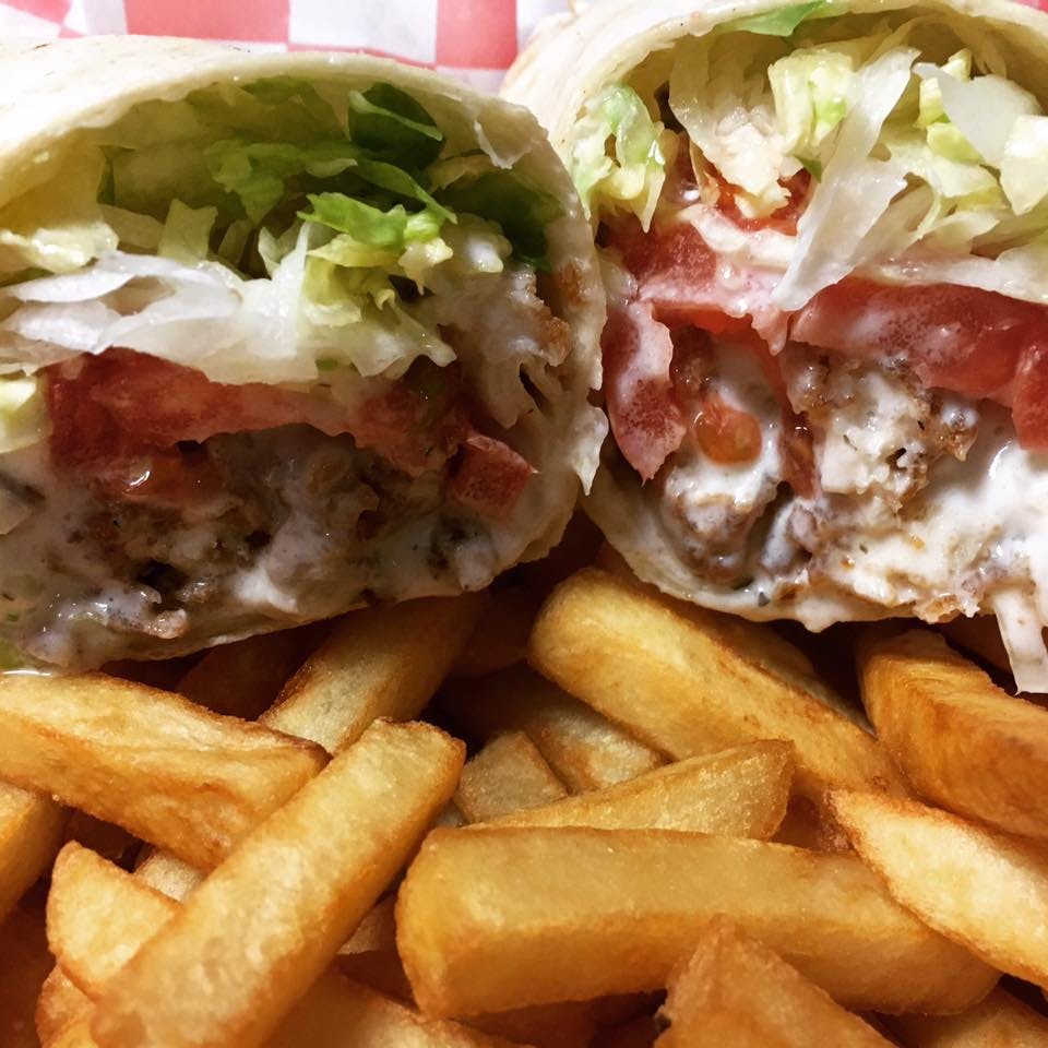 Order Chicken Ranch Wrap - Wrap food online from Nino's Pizzarama store, Willow Grove on bringmethat.com