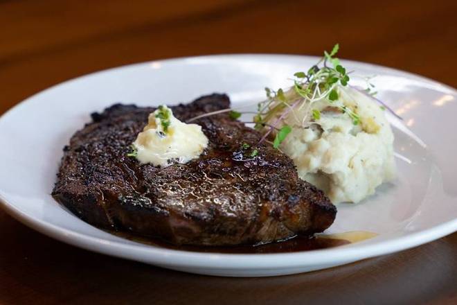 Order Ribeye (12 oz) food online from Seared Chophouse store, Greenville on bringmethat.com