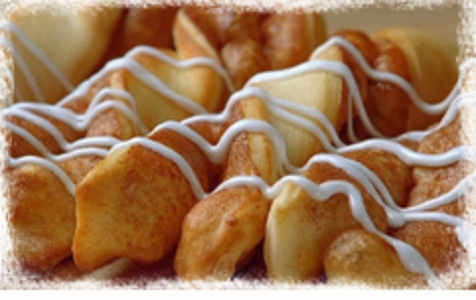 Order Cinnamon Twists food online from Round Table Pizza store, San Diego on bringmethat.com