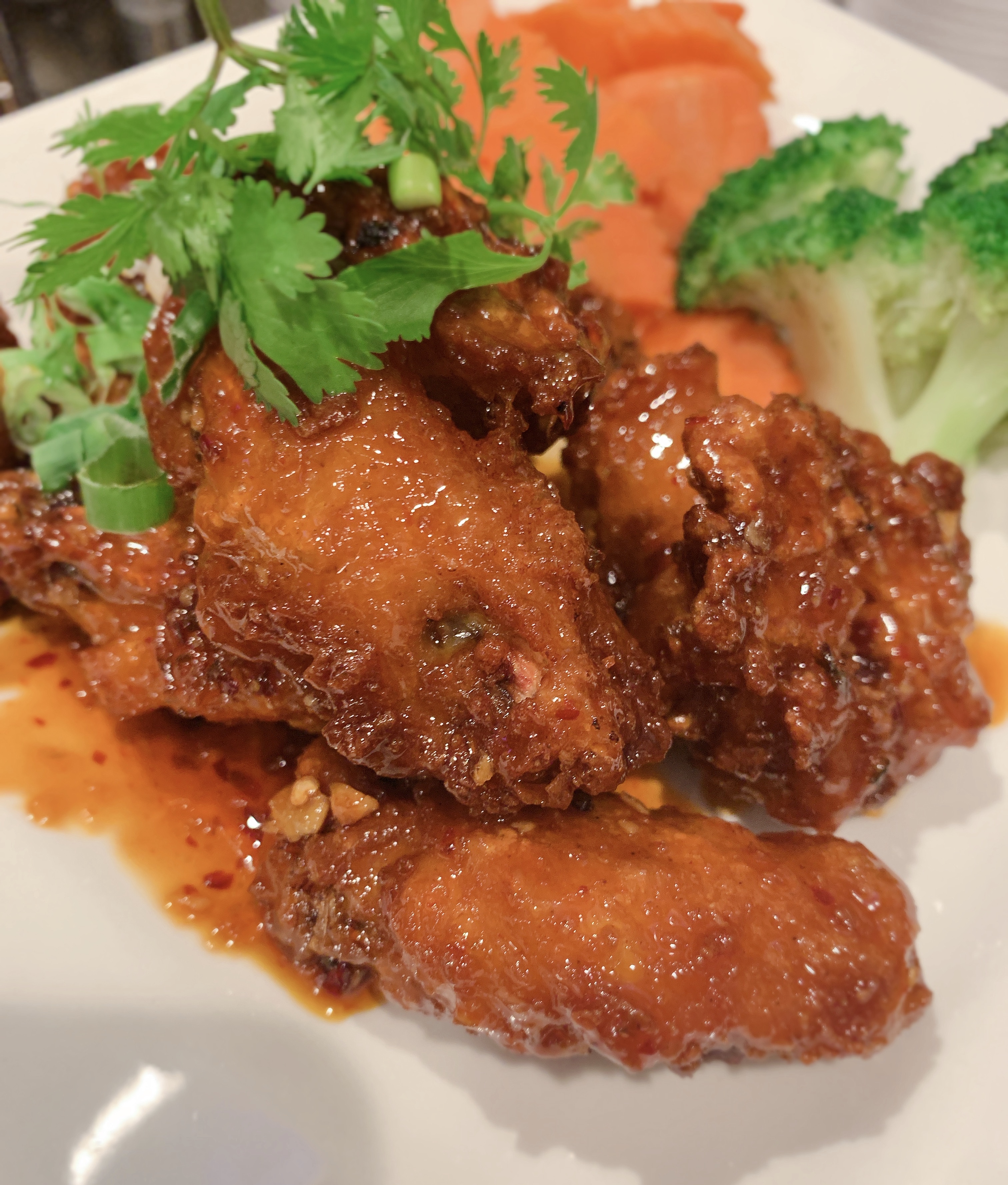 Order 3 favor Hot wing food online from Exotic Thai Cafe store, Woodland Hills on bringmethat.com