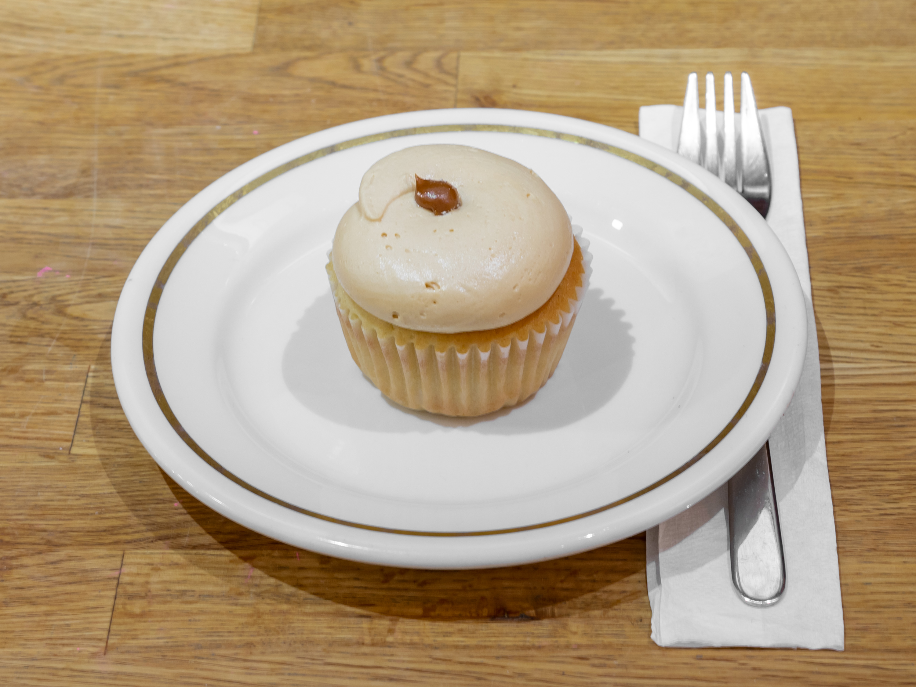 Order Dulce de Leche Cupcake food online from Big Booty Bread Company store, New York on bringmethat.com
