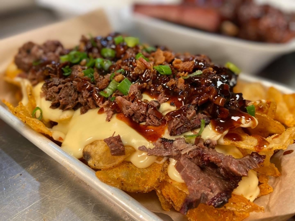 Order Texas Poutine food online from Porky Butts BBQ store, Omaha on bringmethat.com