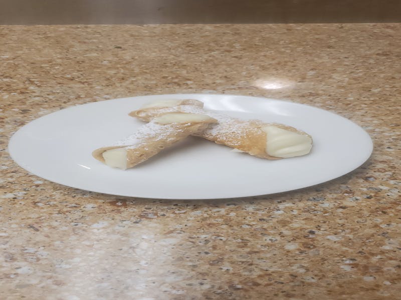 Order Traditional Cannoli - Mini food online from Pizza Leone store, Fairfield on bringmethat.com