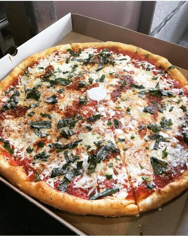 Order Margarita Thin Crust Pizza - Pizza food online from Pizza stop store, New York on bringmethat.com