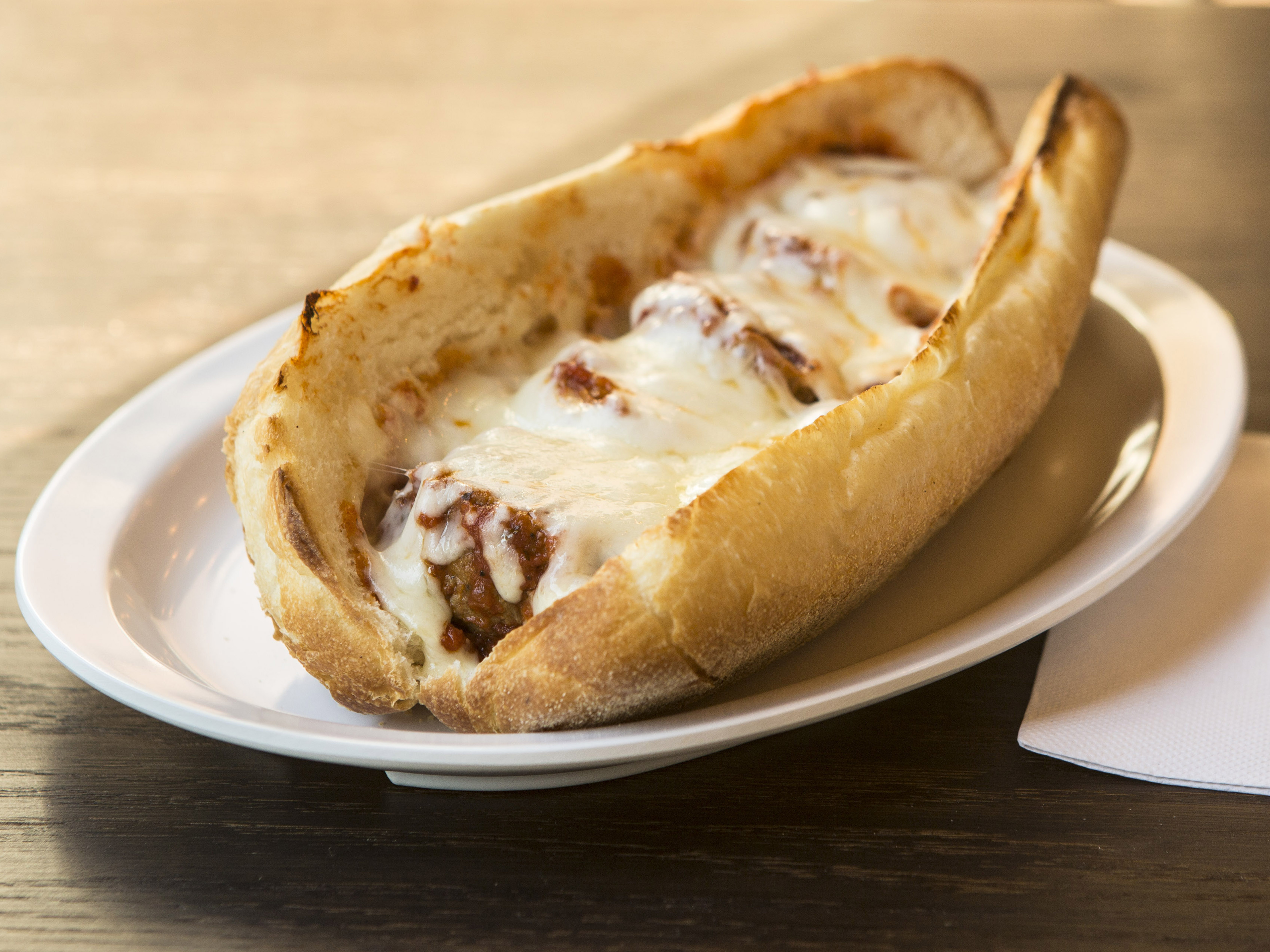 Order Meatball Parmigiana Hero food online from Famous Calabria store, New York on bringmethat.com
