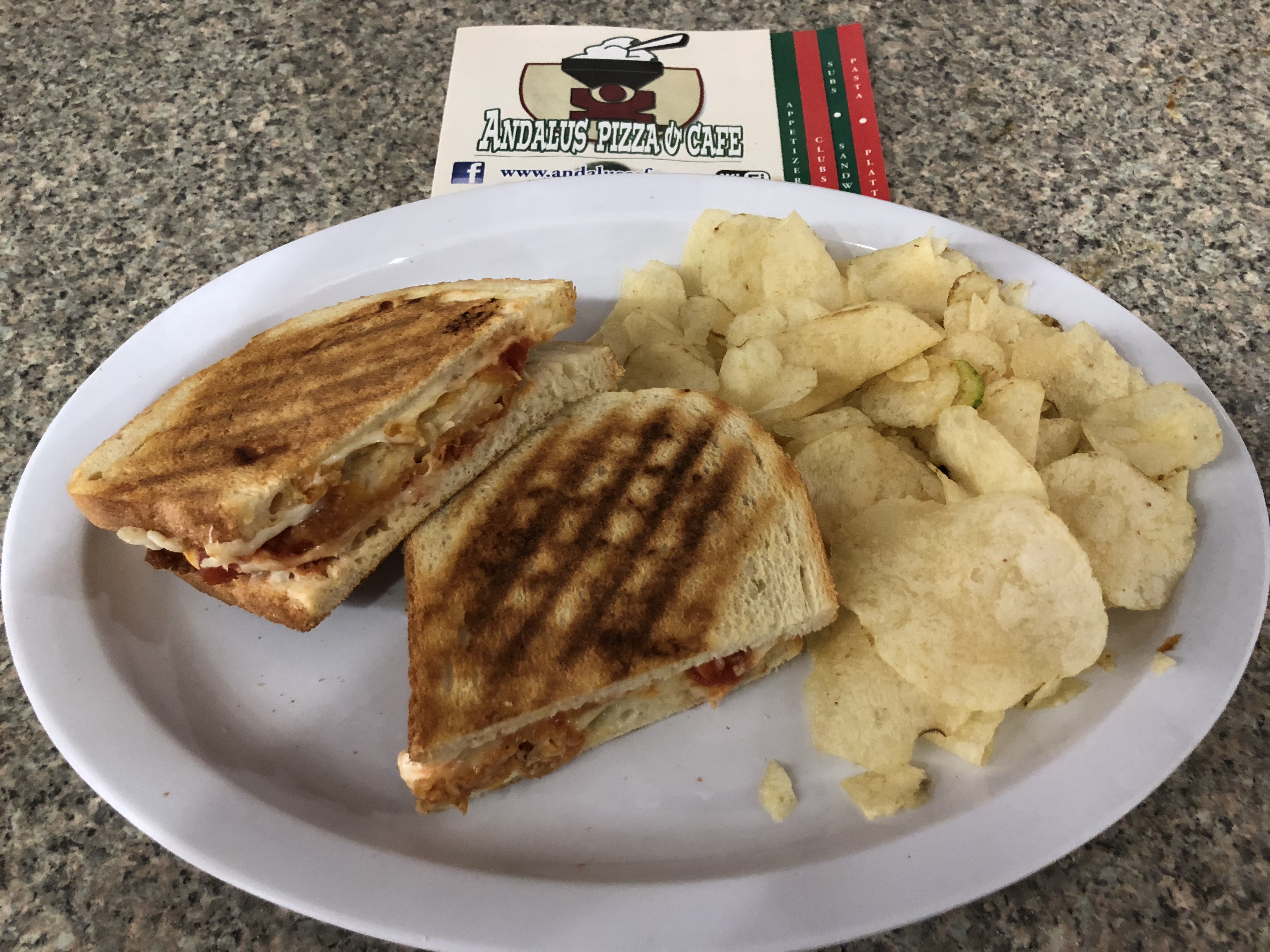 Order The Chicken Parm Panini food online from Andalus Pizza & Cafe store, Brighton on bringmethat.com