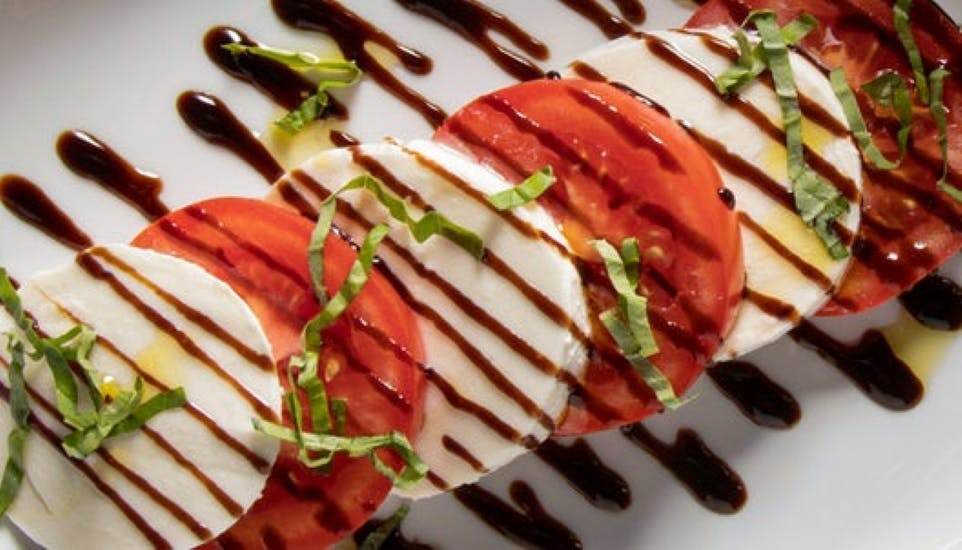 Order Tomato Caprese Salad - Regular food online from Brio Italian Grille store, Murray on bringmethat.com
