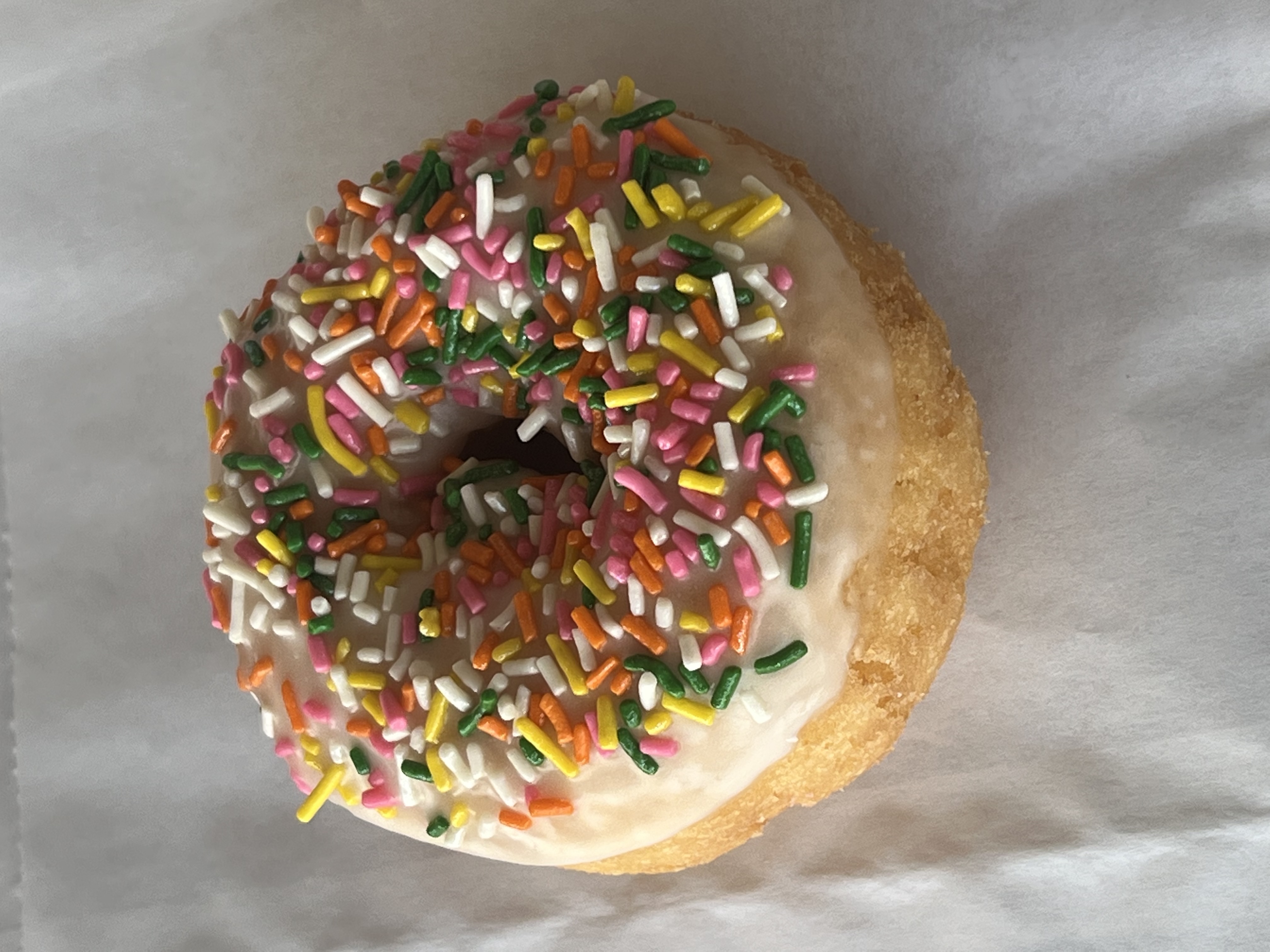 Order Rainbow Sprinkle Glaze Icing Cake food online from Banning Donuts store, Banning on bringmethat.com