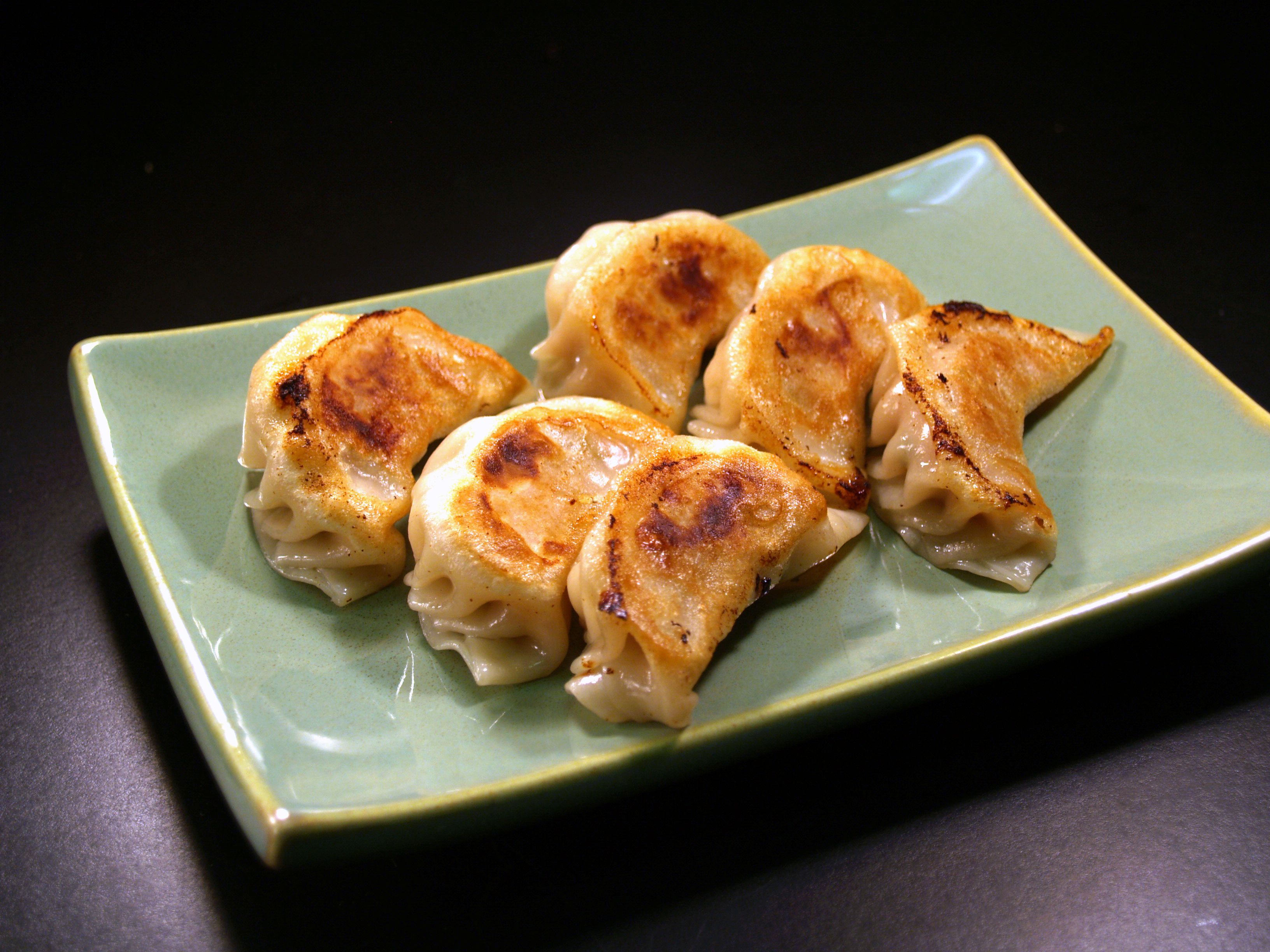 Order V3. Pan Fried Veggie Potstickers food online from Chef Ming store, Beverly Hills on bringmethat.com