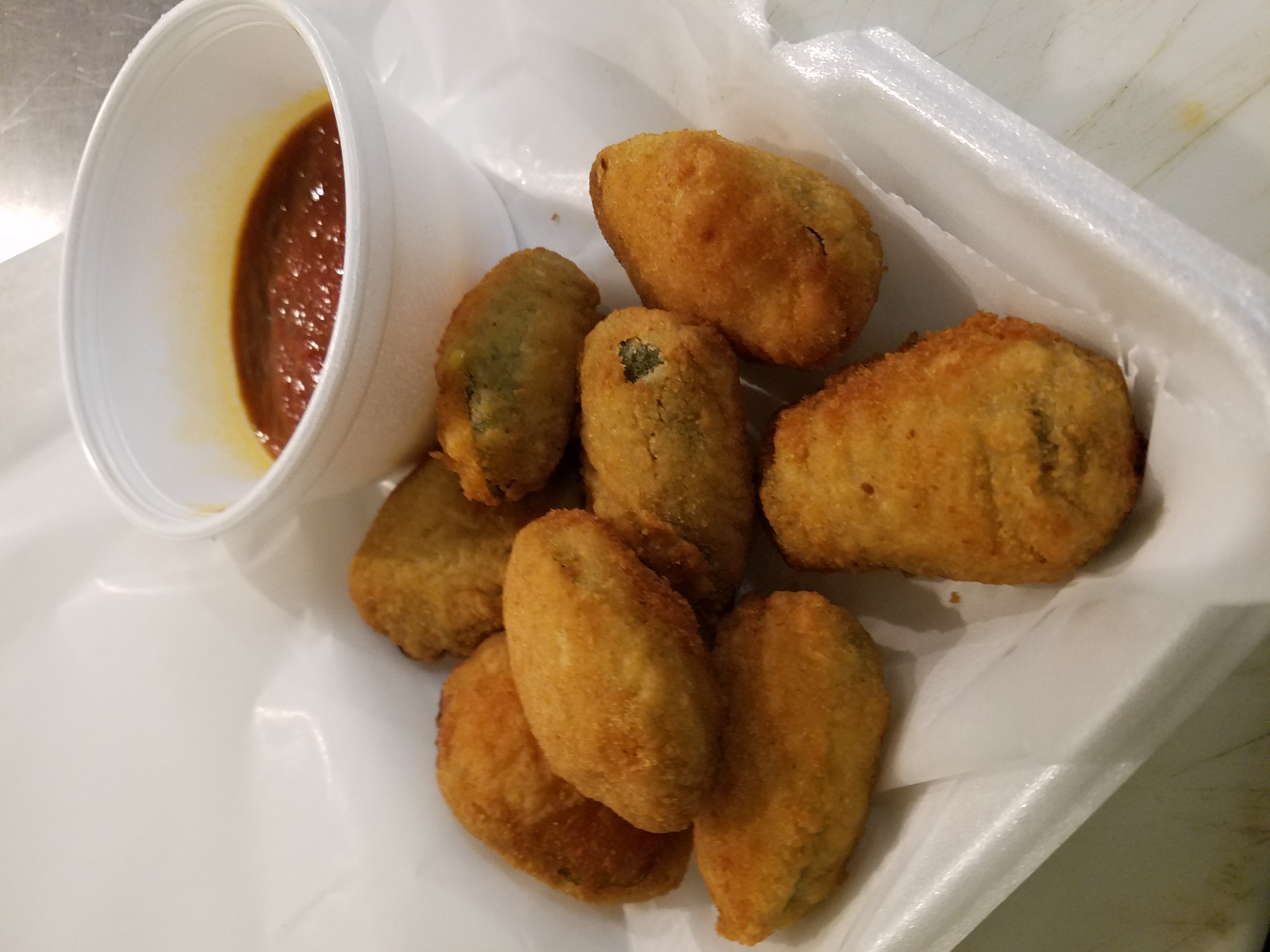 Order 8 Pieces Jalapeno Poppers food online from Nino's Pizza store, Boston on bringmethat.com