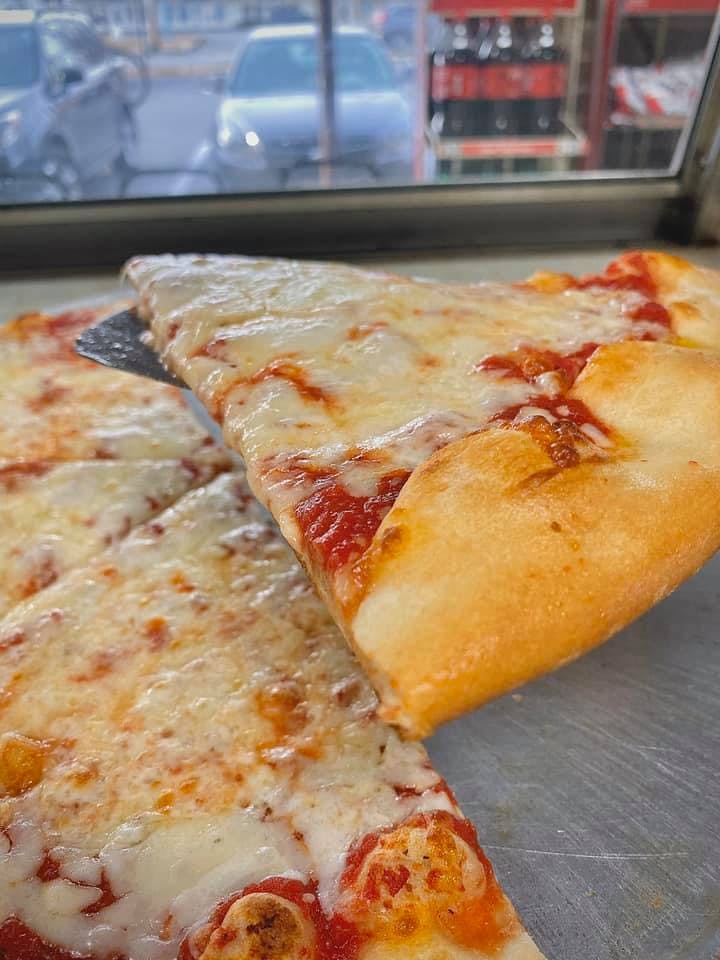 Order New York Style Cheese Pizza - Large food online from Carmelo's Pizza, Pasta, Subs & More!! store, Linthicum Heights on bringmethat.com