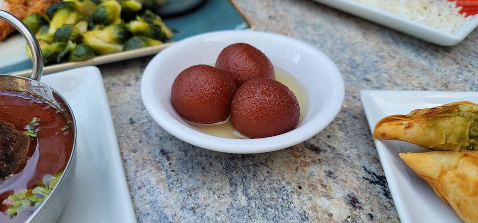 Order Gulab Jamun 4pc food online from Cowboys & Indians Tex-In Kitchen store, Houston on bringmethat.com