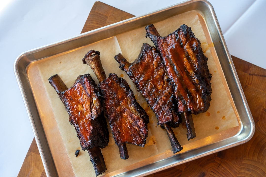 Order Beef Ribs Whole Rack food online from Rocklands Barbeque & Grilling Company store, Arlington on bringmethat.com