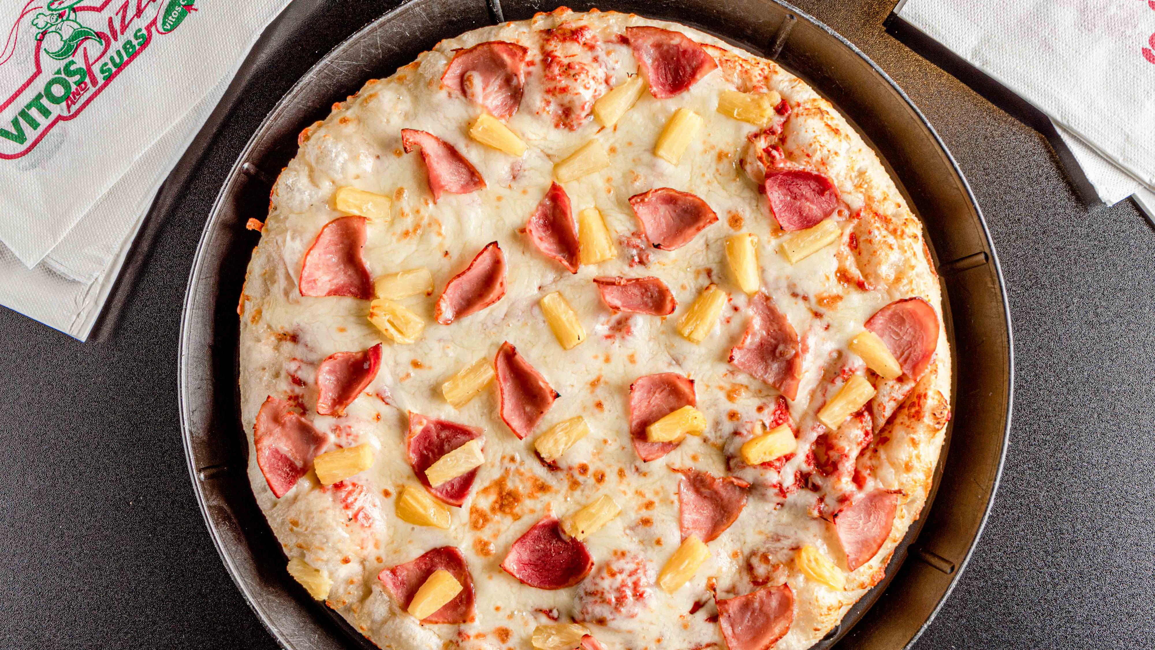 Order Hawaiian Pizza - Lg. food online from Vito Pizza And Subs store, Temperance on bringmethat.com