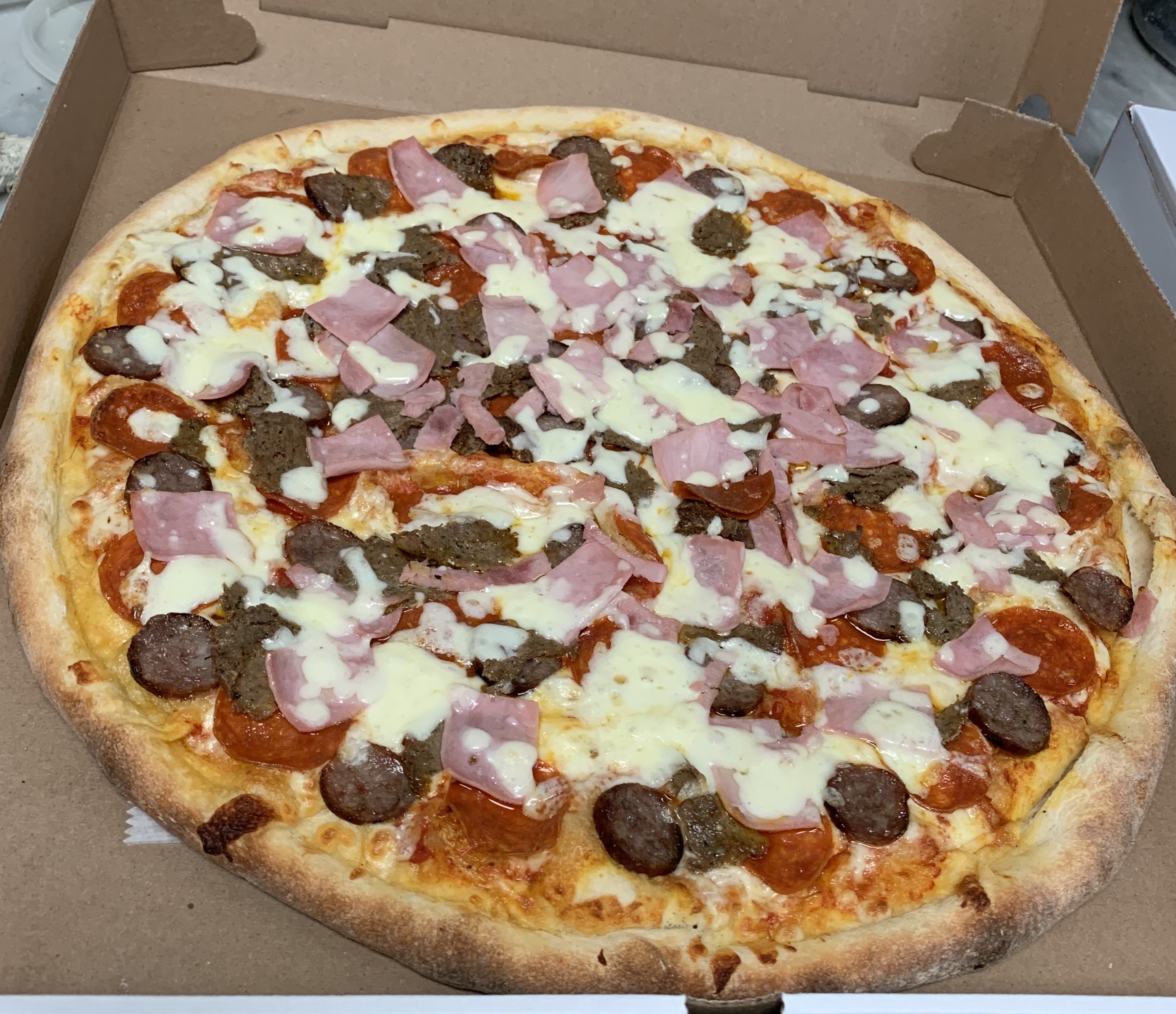 Order Meat Lovers Pizza food online from Nick's Pizza store, North Bergen on bringmethat.com