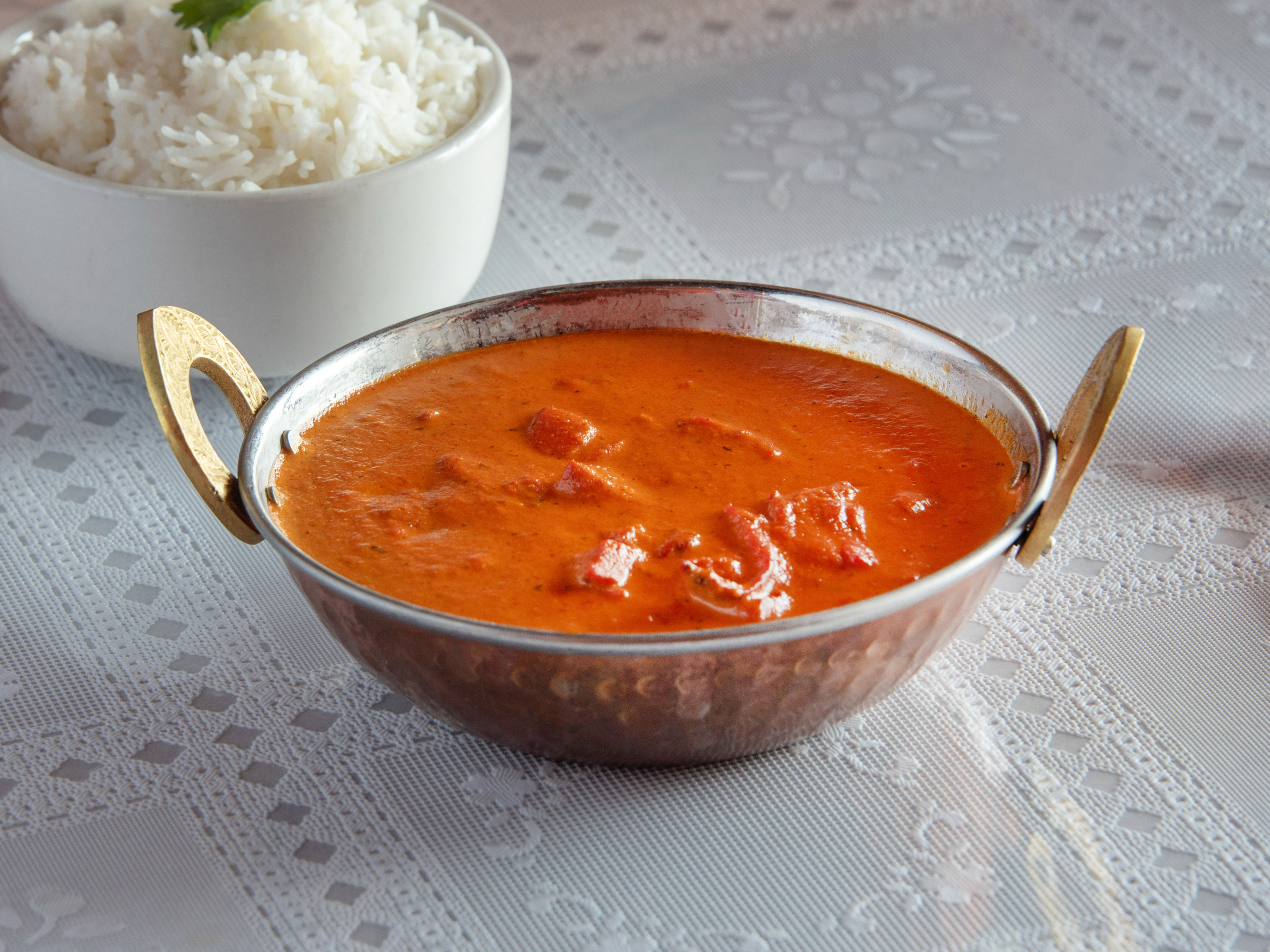 Order Butter Chicken food online from Flavors Indian Cuisine store, Bentonville on bringmethat.com