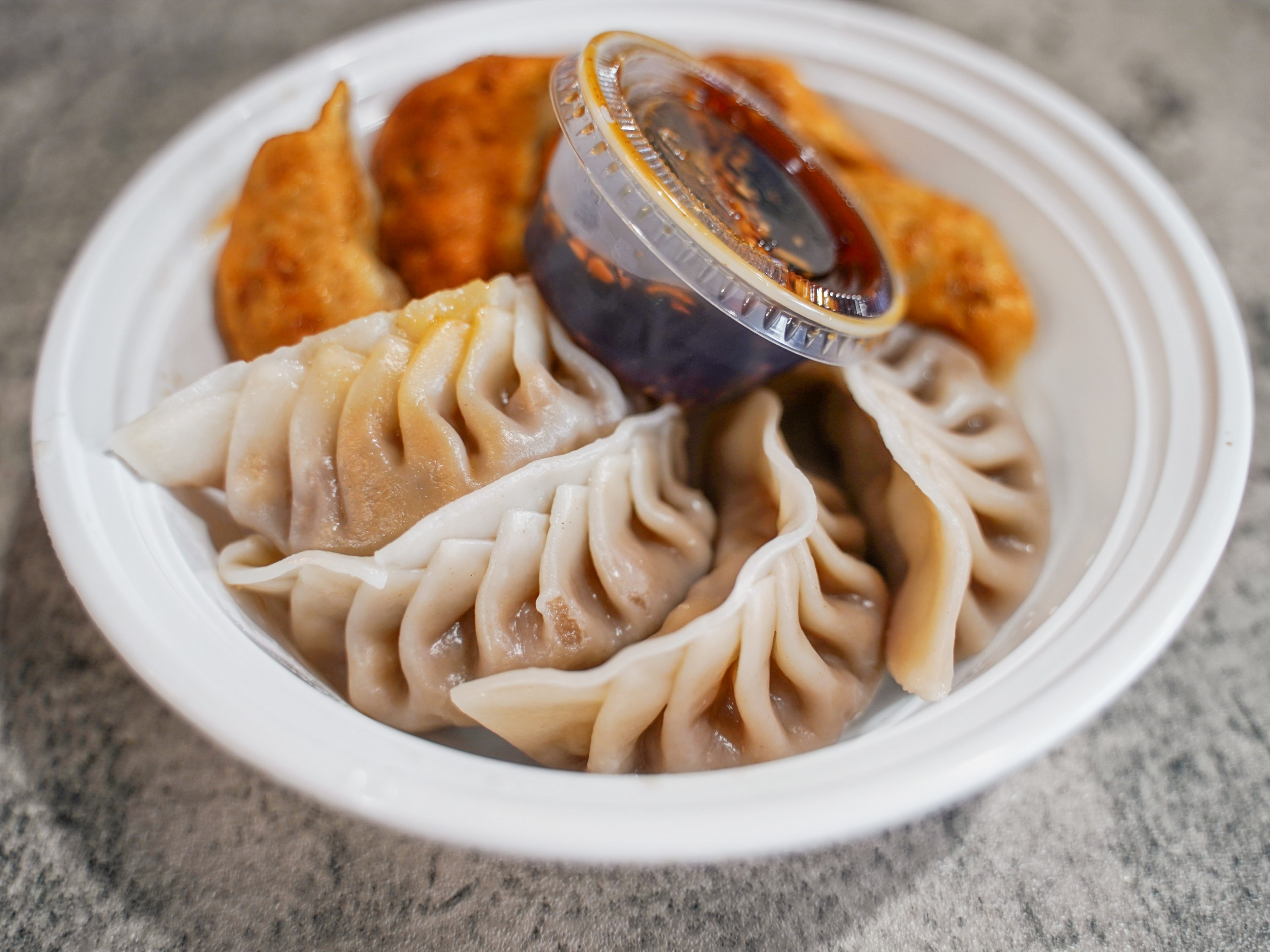 Order 14. Pork Dumplings food online from No.1 China store, Philadelphia on bringmethat.com