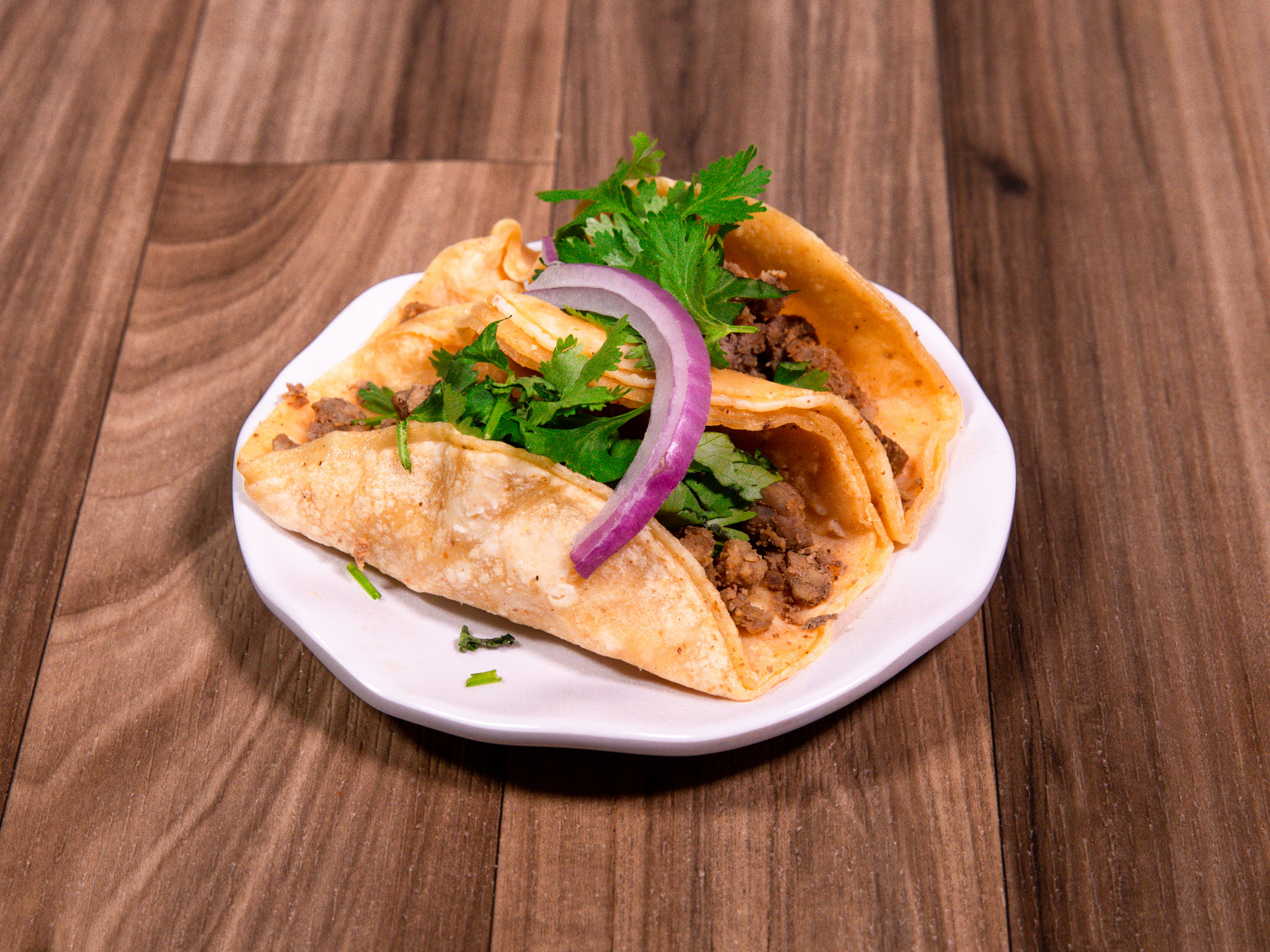 Order Bistek Taco food online from Cesar's Tacos store, Dallas on bringmethat.com