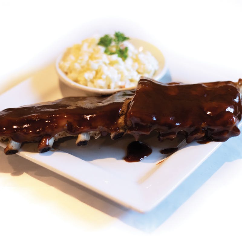 Order BBQ Ribs - Half Rack food online from Angelos Restaurant & Pizza store, Spring Valley on bringmethat.com