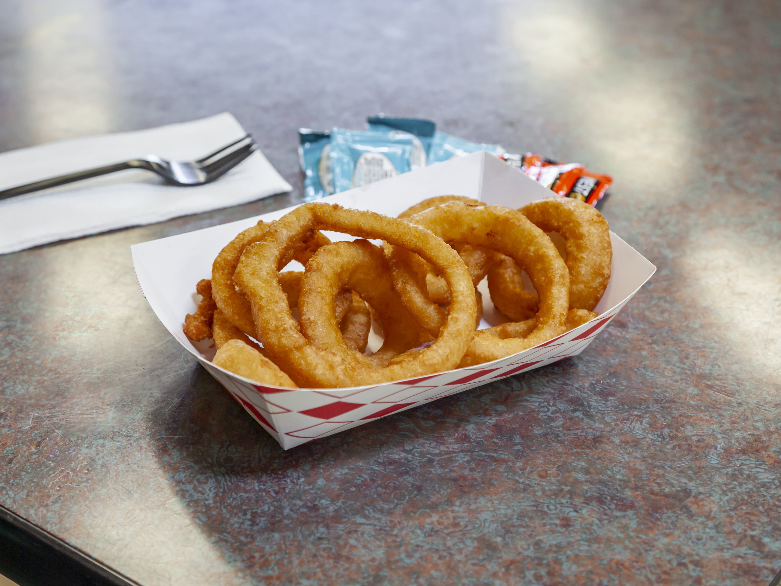 Order Onion Rings food online from Loaded Fries N' Wings store, San Francisco on bringmethat.com