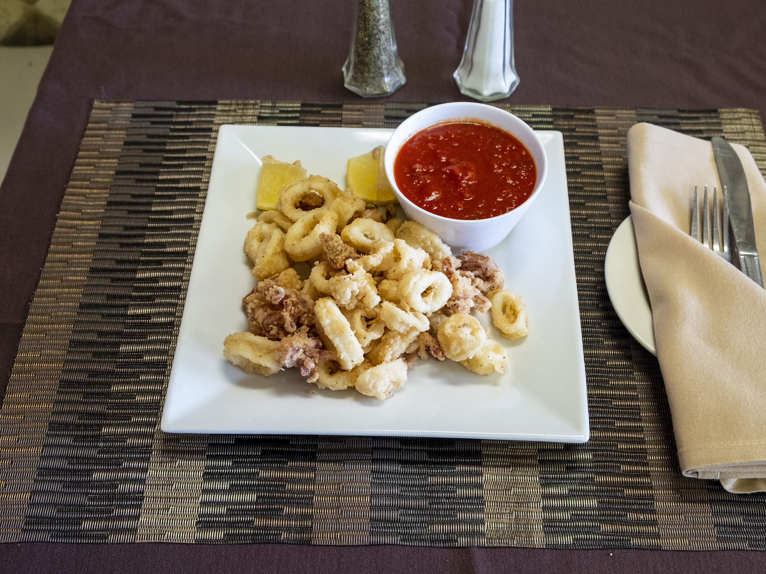 Order Fried Calamari food online from Carmen's Trattoria store, South Plainfield on bringmethat.com