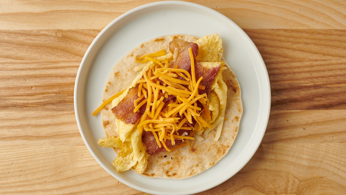 Order BACON BREAKFAST TACO food online from Burrito Beach store, Chicago on bringmethat.com