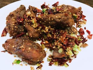 Order 14. Dried Pepper Chicken Back Bone 小熊伴嫁 food online from The Jade Garden store, Lawrence on bringmethat.com