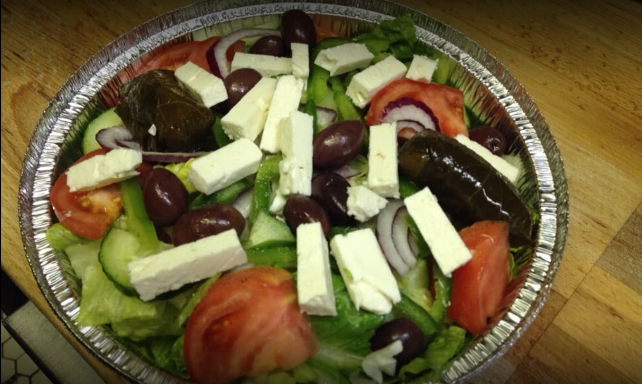Order Greek Salad - Medium food online from Gabriella's Family Pizza store, Flushing on bringmethat.com
